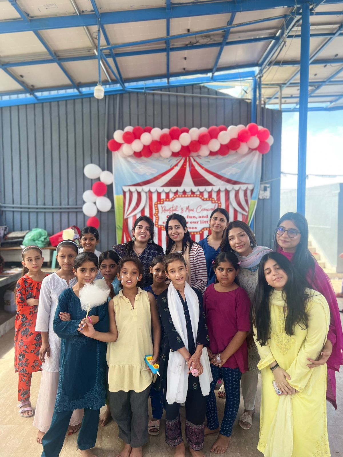 Children and volunteers at Raastah's Mini Carnival